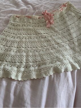 Betsey Johnson Cream Crochet Mini Skirt with Pink Ribbon Like new condition.
